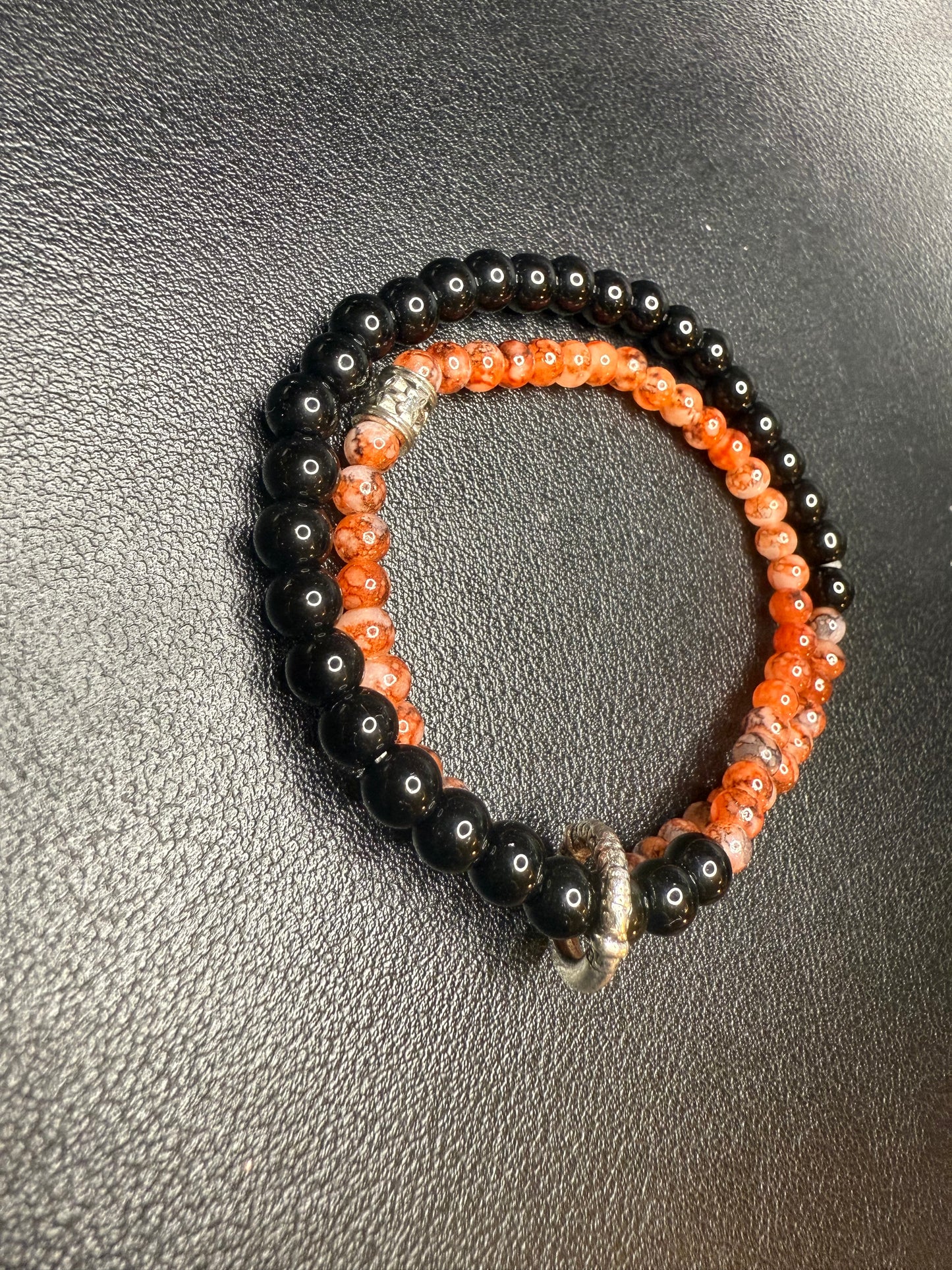 Handcrafted ceramic, glass, and metal beaded bracelet set