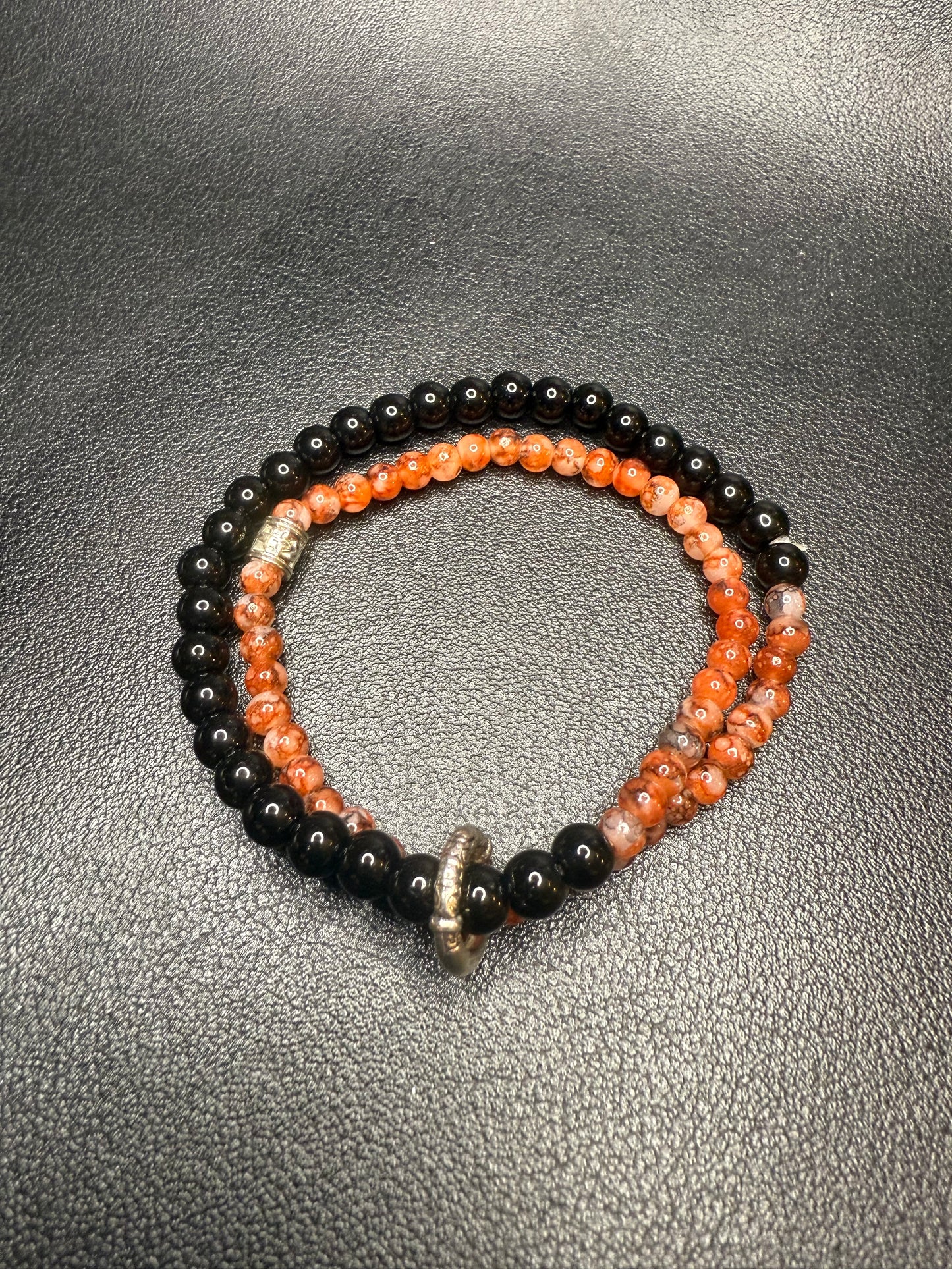 Handcrafted ceramic, glass, and metal beaded bracelet set