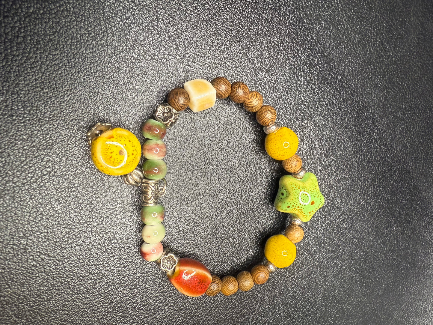 Handcrafted ceramic and wood bedded bracelet