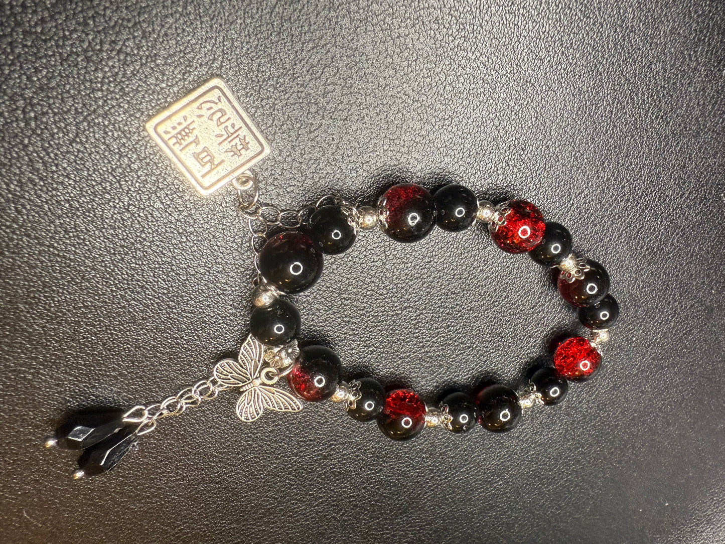 Handcrafted ceramic, glass, and metal beaded bracelet set