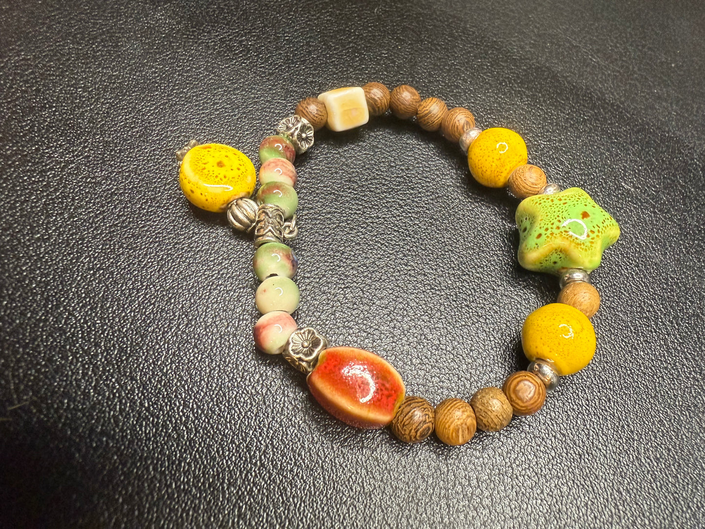 Handcrafted ceramic and wood bedded bracelet