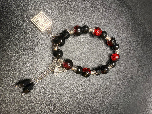 Handcrafted ceramic, glass, and metal beaded bracelet set