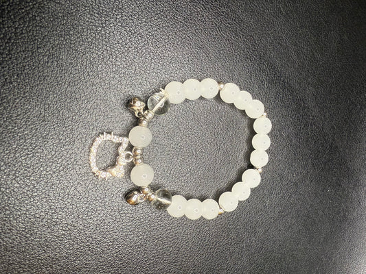Beaded bracelet with metal accent