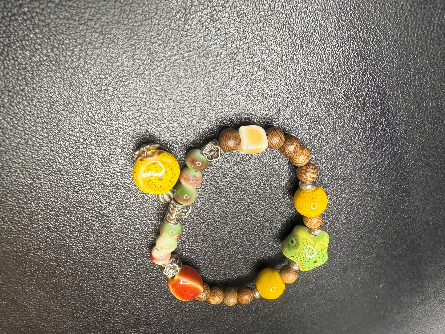 Handcrafted ceramic and wood bedded bracelet