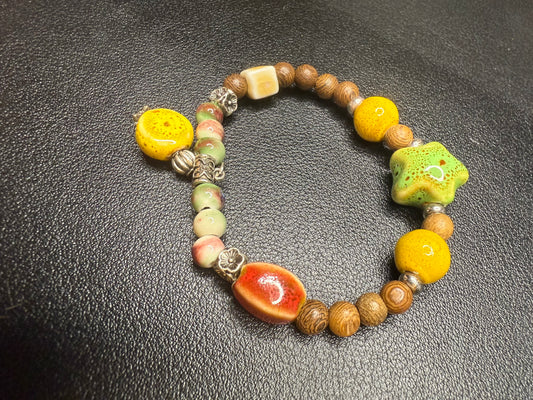 Handcrafted ceramic and wood bedded bracelet